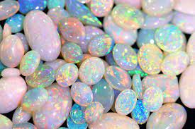 It is deposited at a relatively low temperature and may occur in the fissures of almost any kind of rock, being most c. Learn About Opals Opal Galaxy