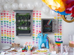 My little pony rainbow party featuring a sparkle rainbow theme with rainbow sequin tablecloth and rainbow candy table with a fabulous rainbow dash cake. My Little Pony Birthday Party A Sweet Little Life