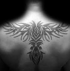 How to pick back tattoos for guys. Amazing Tribal Eagle Tattoo Design On Back For Men Women