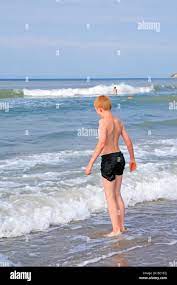 young boy bathing at the Baltic Sea Coast of Mecklenburg-Western Pomerania  in Germany Stock Photo - Alamy