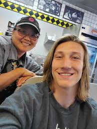 Marissa Lawrence showing love and support for her husband Trevor at last  night's game 💚🏈 Always his biggest fan