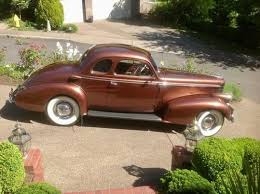 Image result for Mansion Maroon 1938 Oldsmobile