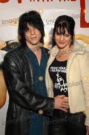 [citation needed] allmusic.com rated the soundtrack 4 out of 5. Photos And Pictures Coyote Shivers And Wife Pauley Perrette At The Premiere Of Down And Out With The Paper Dolls At Cinespace Hollywood Ca 03 12 03