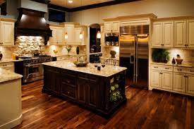Gallery featuring images of 34 kitchens with dark wood floors. 20 Beautiful Kitchens With High Ceilings Dark Wood Kitchen Cabinets Wood Tile Floor Kitchen Cream Colored Kitchen Cabinets