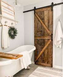Try a vintage vase, basket, or reclaimed wooden ladder for towels. 12 Rustic Bathroom Ideas