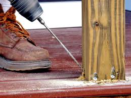 How do i attach a post to an existing deck? How To Install A Porch Railing Hgtv