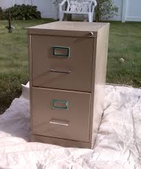 Once dry, update its face with a fresh coat of paint and hardware. How To Paint A Metal File Cabinet Stop Me If You Ve Heard This One