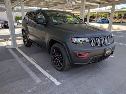 Black And Red Jeep Grand Cherokee 2017 Jeep Grand Cherokee Altitude With Matte Black Vinyl Wrap And Red Caliper Covers Jeep Grand Jeep Grand Cherokee Jeep Truck