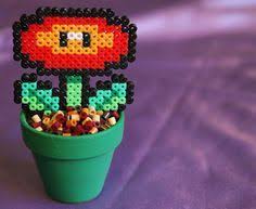 Dites Le Avec Des Fleurs Et En Perles A Repasser Perle A Repasser Modeles Perle Hama Modele Et Fleurs