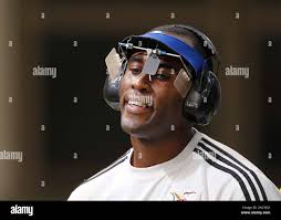 Daniel Roger Peter of Trinidad and Tobago reacts during the 10 meter air  pistol event during the Commonwealth Games at the Dr. Karni Singh Shooting  Range in New Delhi, India, Friday, Oct.