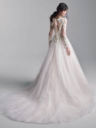 There are quite a number of designs featuring open or lace back wedding dresses. 11 Dramatic Back Wedding Dresses For The Statement Bride