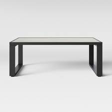 This coffee table is the perfect size in front of your sofa and you can keep items out of sight on the bottom shelf. Henning Square Patio Coffee Table Project 62 Target