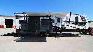 Toy hauler with patio deck. 2021 Stryker 3212 Travel Trailer Toy Hauler Side Patio Deck 12 Vans Suvs And Trucks Cars