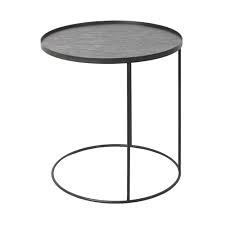 His signature craftsmanship and geometric artistry is echoed in these modern nesting trays. Round Tray Side Table Large