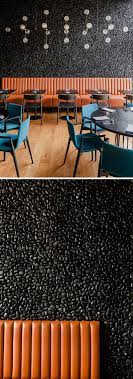 the campo modern grill was designed with hand laid black pebble accent walls banquette seating restaurant modern restaurant restaurant seating