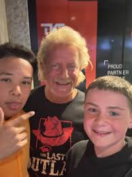 My grandson Trent and his friend Nash giving the legendary Jeff Jarrett  some wrestling tips before his big match in the FEDEX Forum last night..