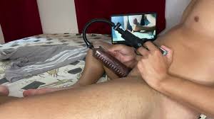 my dick with 22 cm very hard inside the penis pump watching a hot naughty  doing spanish