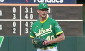 Oakland athletics' chris bassitt pitches against the texas rangers during the first inning of a. Q2msqbzwqp9yam