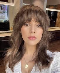 The Wolf Cut 🐺 is this years hottest trend!! 🔝 The wolf cut is a soft,  shaggy combination between a classic shag haircut and a severe mullet. So  HOT ☄️ right now!!