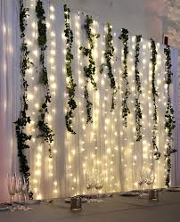 Lights Tulle And Greenery Diy Wedding Decorations Wedding Decorations Affordable Diy Wedding