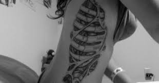 Most of the men mainly the from the young age group like to show off their toned body and the ribcage so having. Pin By Joe Parra On Skin Candy Ribcage Tattoo Rib Tattoo Cage Tattoos