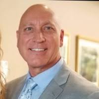 Aaron Woolley, CMA, EA