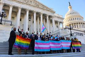 Congresswoman marie newman, whose daughter is transgender, spoke in favor of a bill banning discrimination against lgbtq so newman put a transgender flag outside greene's office. C9ponc1zwgl1nm