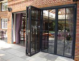 Bifold doors don't need to have a modern look. Timber Bi Fold Doors Folding Patio Doors Bifold Doors Uk