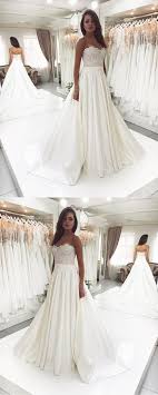 Search by silhouette, price, neckline and more. A Line Sweetheart Ivory Satin Wedding Dress Lace Wedding Gown With Beaded Dressmeet Online Store Powered By Storenvy