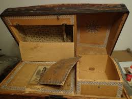 The interior has a top shelf that removes to reveal the interior. Remove Odors Smells Old Steamer Trunks Antique Trunks Chests