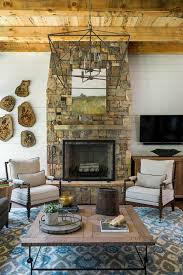 Karly rauner inspiration for a timeless open concept light wood floor living room remodel in other with a stone fireplace, beige walls, a standard fireplace and a media wall not the material i'd. Stone Fireplace Ideas For Cozy Comfort Town Country Living