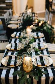 Birthday Black And White Table Setting The Easiest Way To Add Black And White Into Your Reception Is With Stripes Le White Wedding Decorations White Wedding Table Setting Black And White Tablecloth