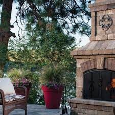 Place your angle iron such that the top of the angle leg is flush with the top of the lintel blocks. Outdoor Stone Fireplace Kitchen Kits Belgard Pavers