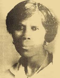 This photo is from Marion County and was made probably near the end of  1917. The seated lady is my great grandmother Martha "Mattie" Regan Ginn  Bedwell, a daughter of Rufus and