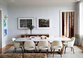 An oval dining table set is ideal. A Sophisticated New York City Family Home Dining Room Wallpaper Beautiful Dining Rooms Dining Room Design