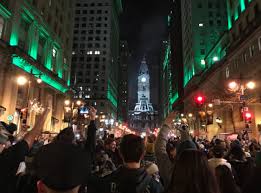 Philadelphia eagles players celebrate on broad street during the super bowl championship parade on feb. Philadelphia Celebrates Eagles Super Bowl Win With Pole Climbing Awning Diving Van Roof Riding And Fire The Interrobang