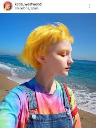 And the cute, canary yellow band of color is an absolutely stunning, horizontal highlight that frames the model's face. Yellow Hair Blue And Color Hair Image 6332190 On Favim Com