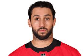 VINCENT TROCHECK SIGNED NEW YORK RANGERS HOCKEY PUCK W/ CASE