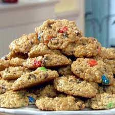 Grease a large baking sheet or use parchment paper. Guest Post Monster Cookie Recipe Monster Cookies Recipe Food Network Recipes Paula Deen Monster Cookie Recipe