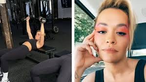 Rita Ora shares cheeky snaps of herself covered in the snow in throwback  ski trip snaps