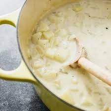 An Old Fashioned Potato Soup Homemade In A Dutch Oven And Stirred With A Wooden Spoon Old Fashioned Potato Soup Homemade Potato Soup Potato Bacon Soup
