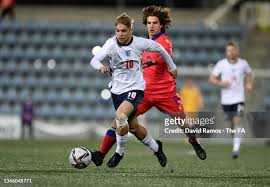 Emile Smith Rowe of England is put under pressure by Daniel Bienert... News  Photo