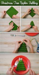 Take Your Table Settings To The Next Level With This Diy Christmas Tree Napkin Folding Cute Diy Projects Diy Christmas Table Christmas Tree Napkins Christmas Origami