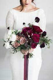 Read articles and watch videos about wedding flowers. Deep Purple Wedding Bouquets