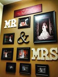 Home is where the heart is. Mr Mrs Decorating Deas Picture Frame Arrangement Wedding Picture Walls Picture Display Wall Wedding Photo Walls