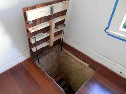 Things To Consider When Building Trap Doors Survivalkit Com Padding And Cover Onsider Placing The Door On Flooring Tha Trap Door Hidden Rooms Secret Rooms