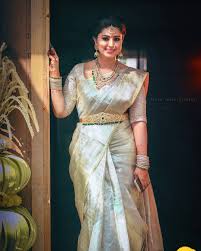 The Most Adorable Way To Wear A White Silk Saree Keep Me Stylish South Indian Wedding Saree Saree Trends Bridal Sarees South Indian