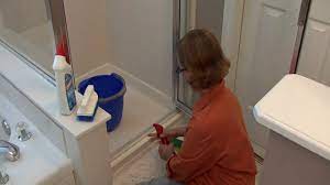 How to clean your shower's glass doors & walls begin by wetting the shower glass with the shower sprayer or splashing the walls with a bucket. 5 Tips To Clean Shower Door Tracks