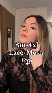 Women Singer Wearing Chain Mesh Top at Concert