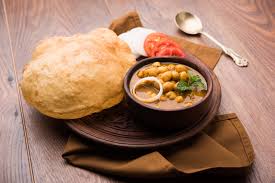 The combination of 'chickpea curry' and 'fried flatbreads' is known as 'chole bhature'. Balaji Chole Bhature Home Delivery Order Online Kacheri Road Hapur Hapur